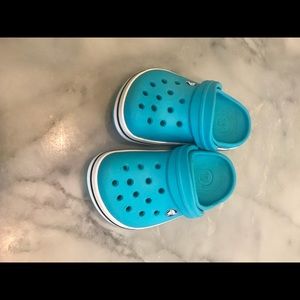 Turquoise crocs